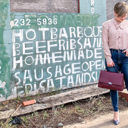 ruffle striped buttondown shirt with jeans and accessories