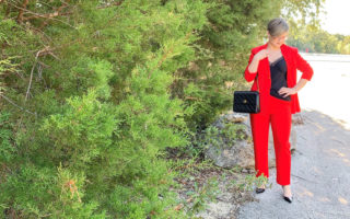 red suit with black cami and heels