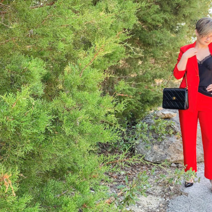 red suit with black cami and heels